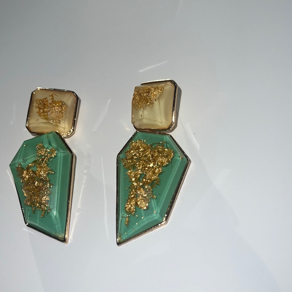 drop earrings with gold flakes.